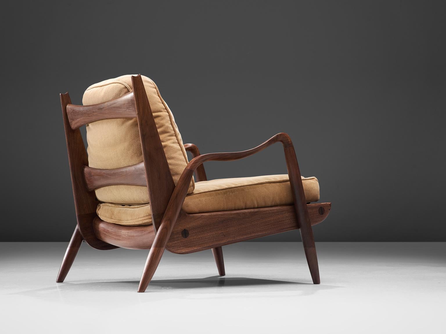Sculptural walnut lounge chair